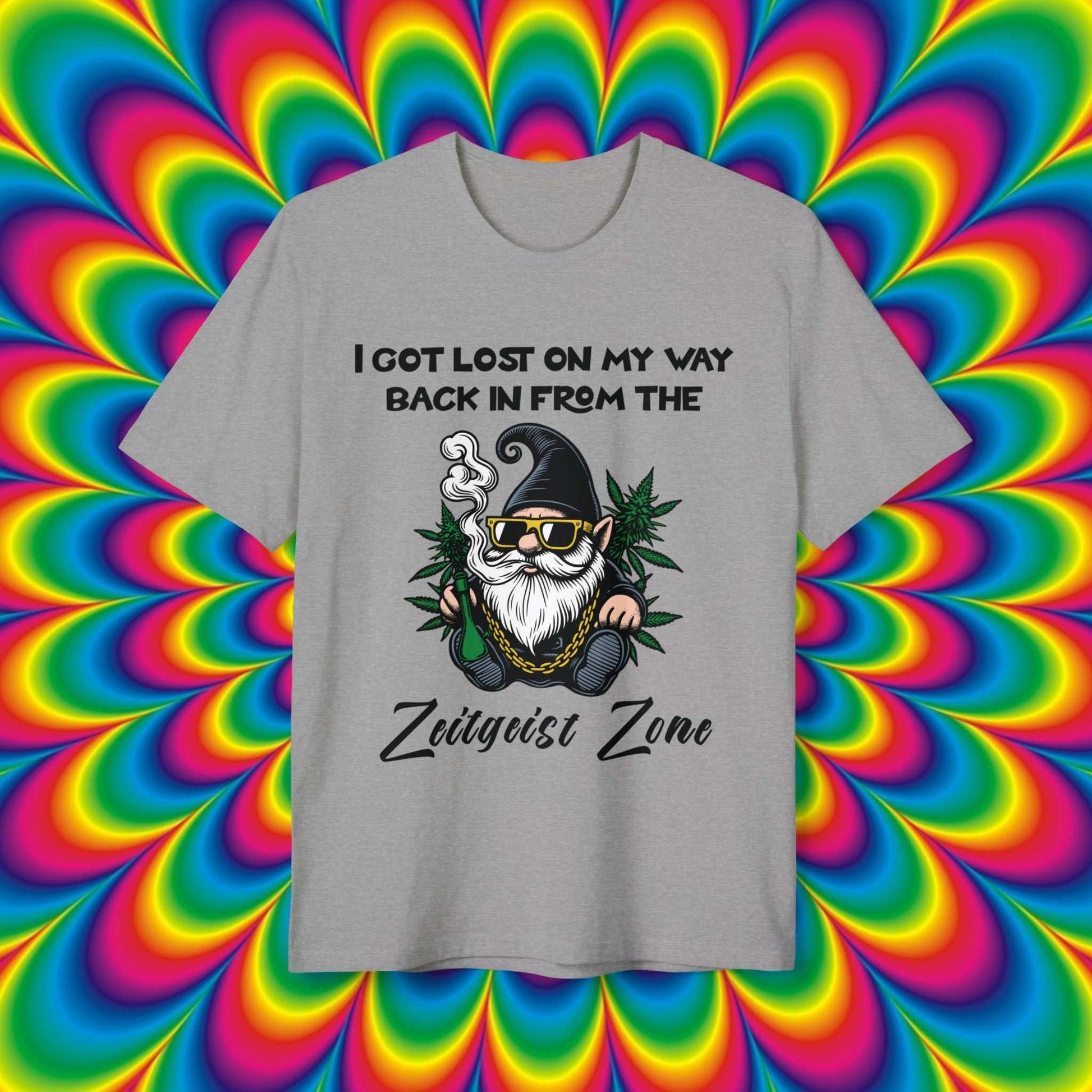 Zeitgeist Zone Light Grey t-shirt with a graphic of a gnome smoking a pipe and text 'I got lost on my way back in from the Zeitgeist Zone'.