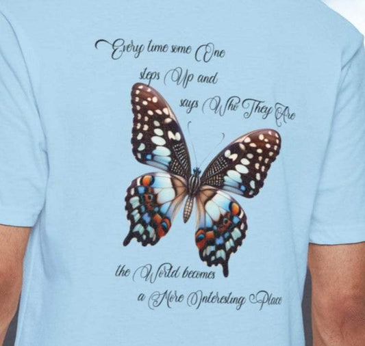 Butterfly Evolution text: 'Every time some one steps up and says Who they are the world becomes a more interesting place.' On the back of a person wearing a light blue tee