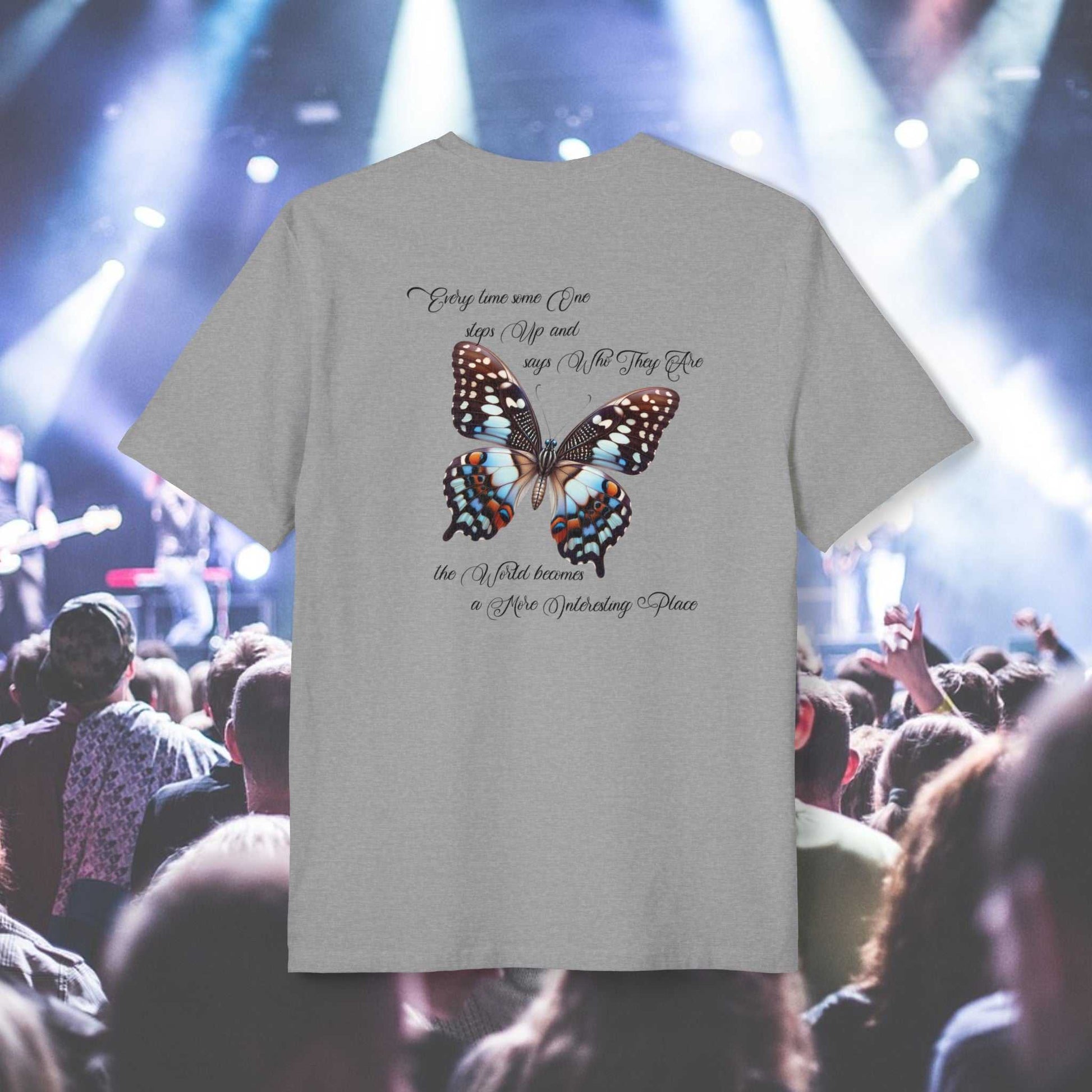 Butterfly Evolution text: 'Every time some one steps up and says Who they are the world becomes a more interesting place.' On the back of a person wearing a light grey tee