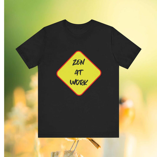 Zen at Work text on yellow diamond with red trim design on a Black t-shirt