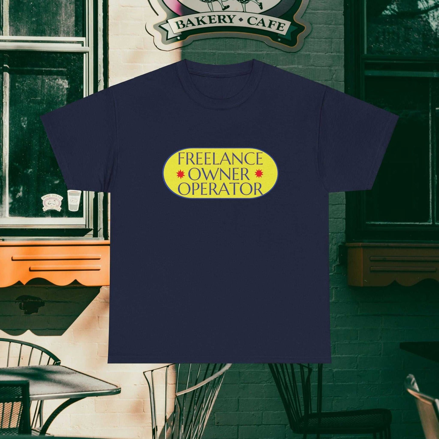 Freelance Owner Operator design on a navy tee with vintage bakery background