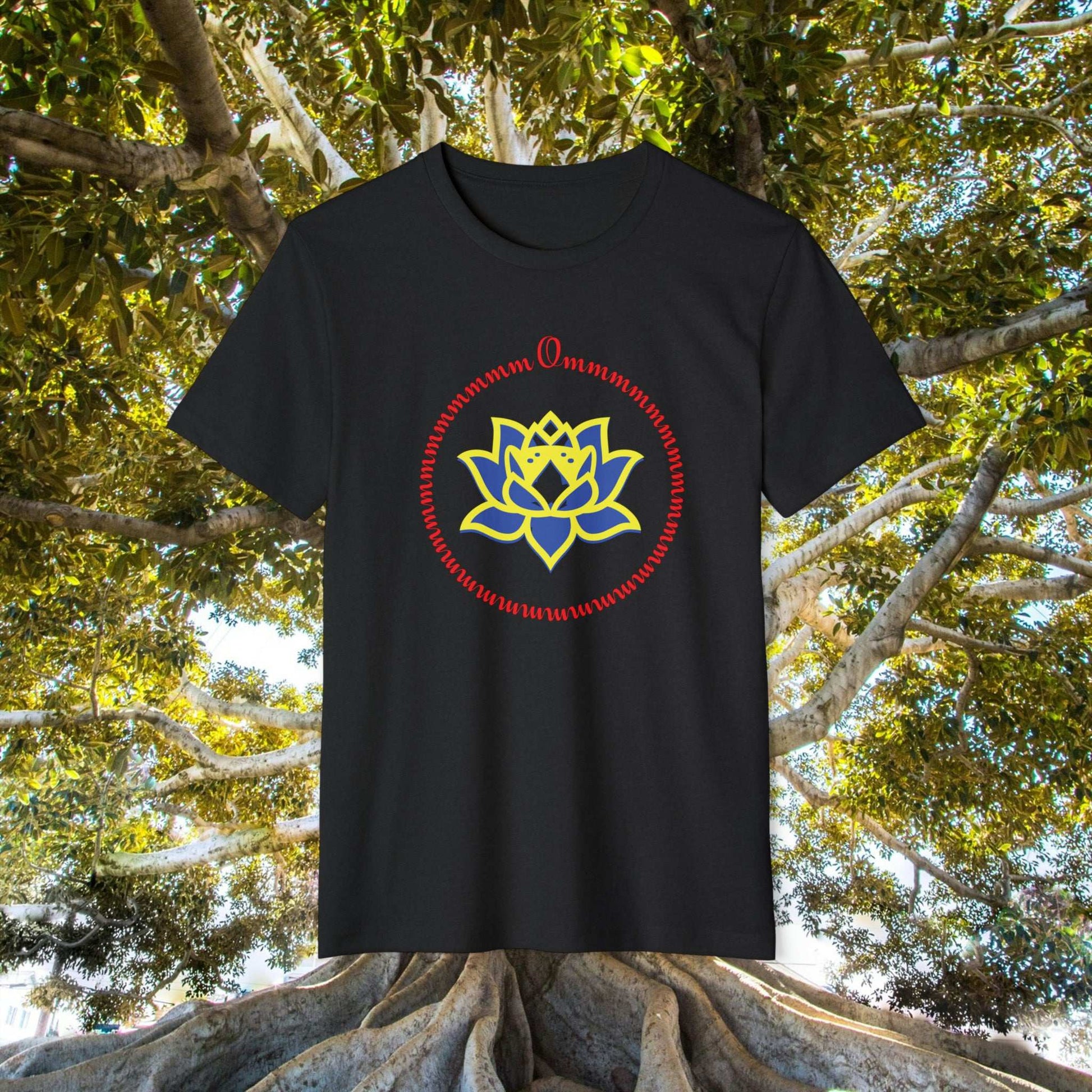 Om letters circling a blue lotus outlined in yellow, on a black tee