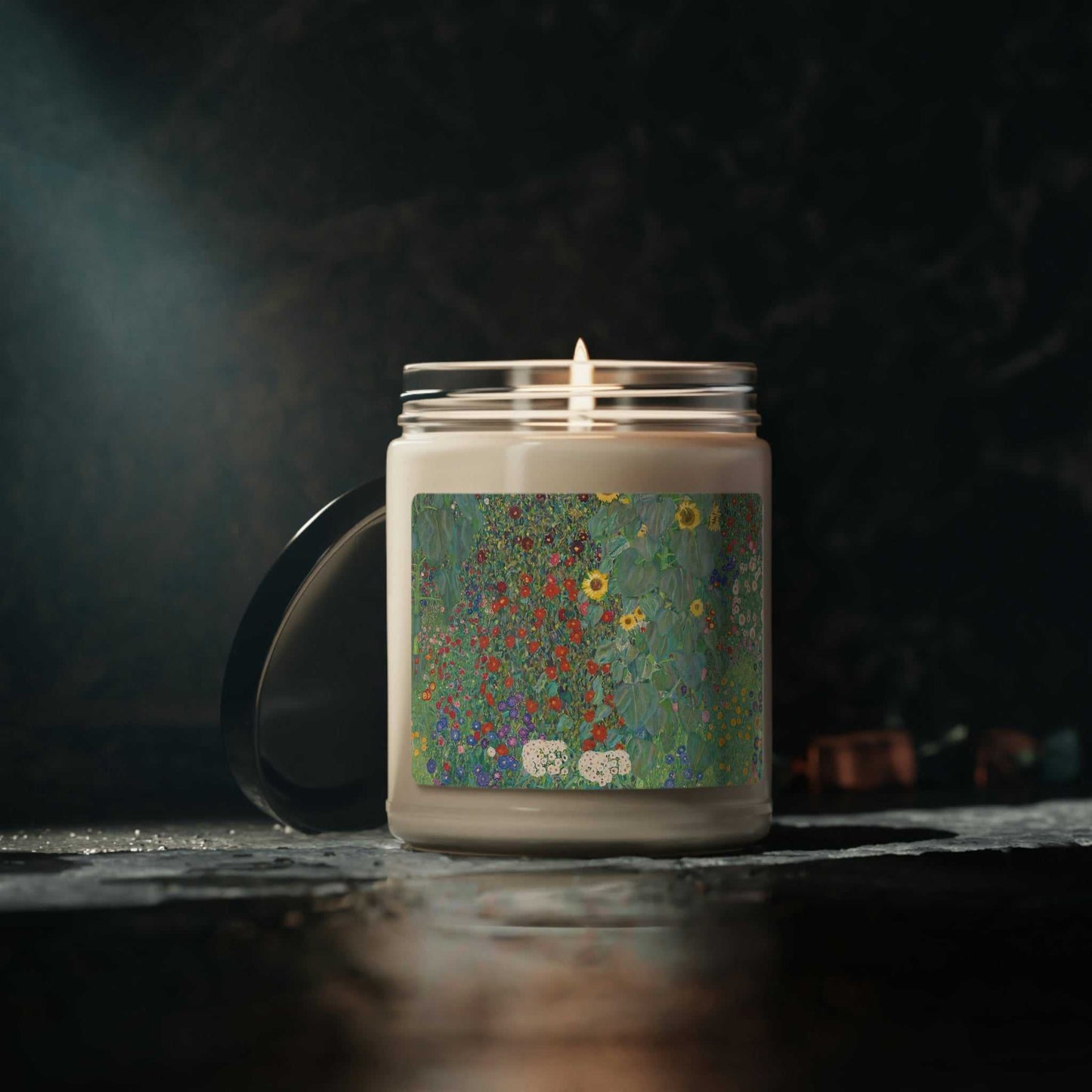 Scented Soy Candle "Apple Harvest" glass jar with Klimt's garden picture, lit on holiday table