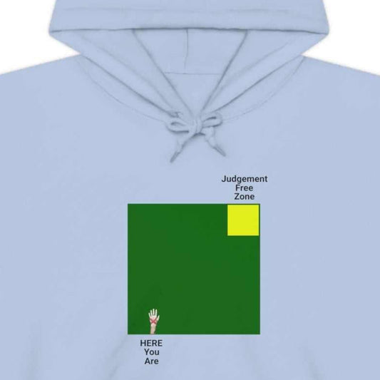 Judgement Free Zone text above small yellow box withing large green block, text HERE You Are under opposite corner, on a light bluehoodie