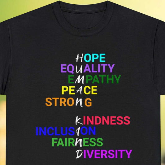 Human Kind spelled out by single letter of stacked different colored words Hope Equality Empathy Peace Strong Kindness Inclusion Fairness Diversity, on a Black tee