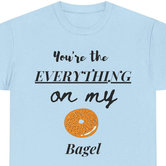Everything Bagel tee in light blue with text You're the EVERYTHING on my Bagel, with a graphic of a bagel.